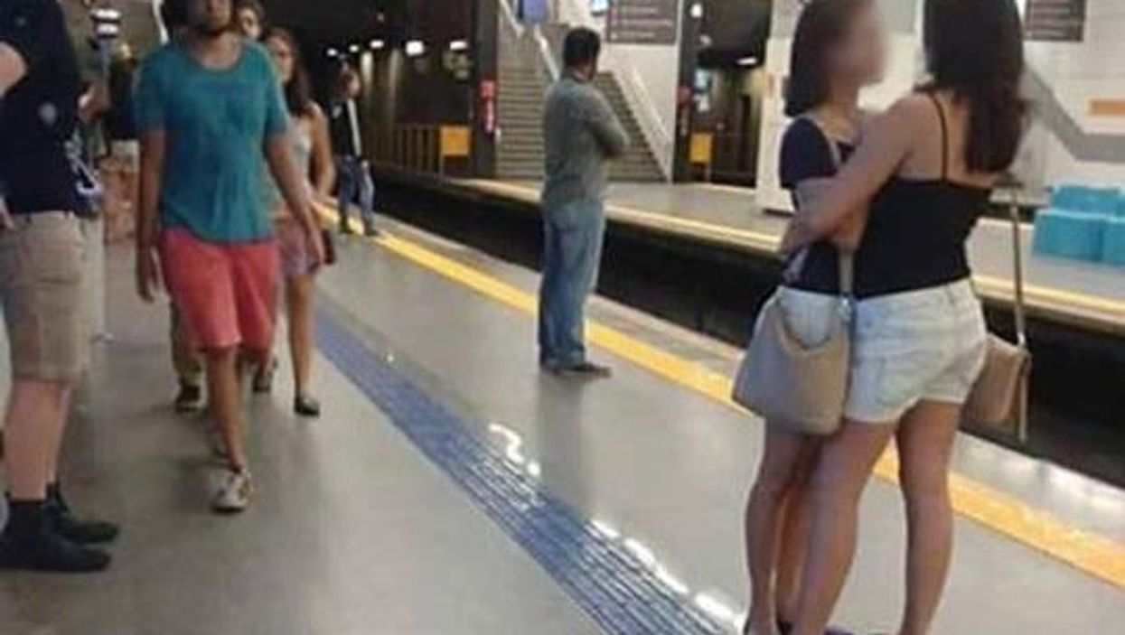Why this 'absurd' picture of two women hugging on a train platform went viral