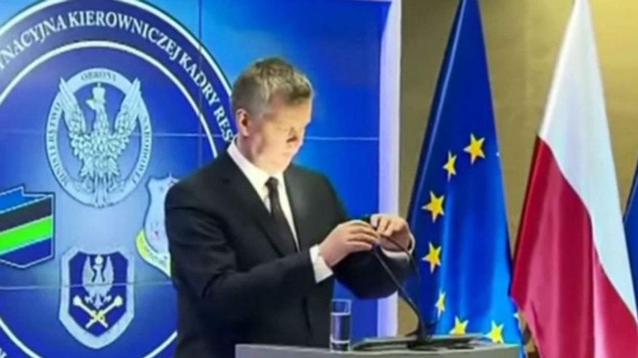 That time when Poland's deputy PM mistook a lamp for a microphone