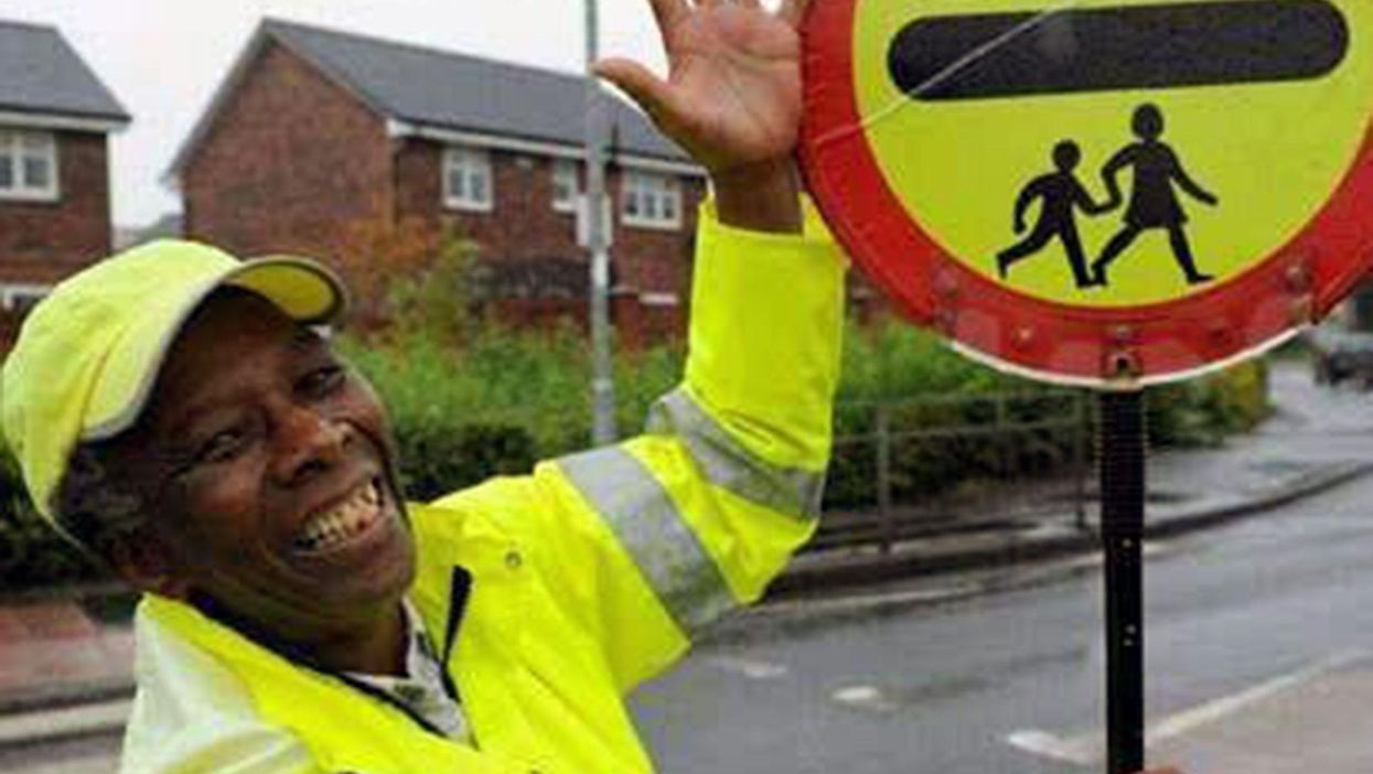 Meet the lollipop man told to stop 'high-fiving' children