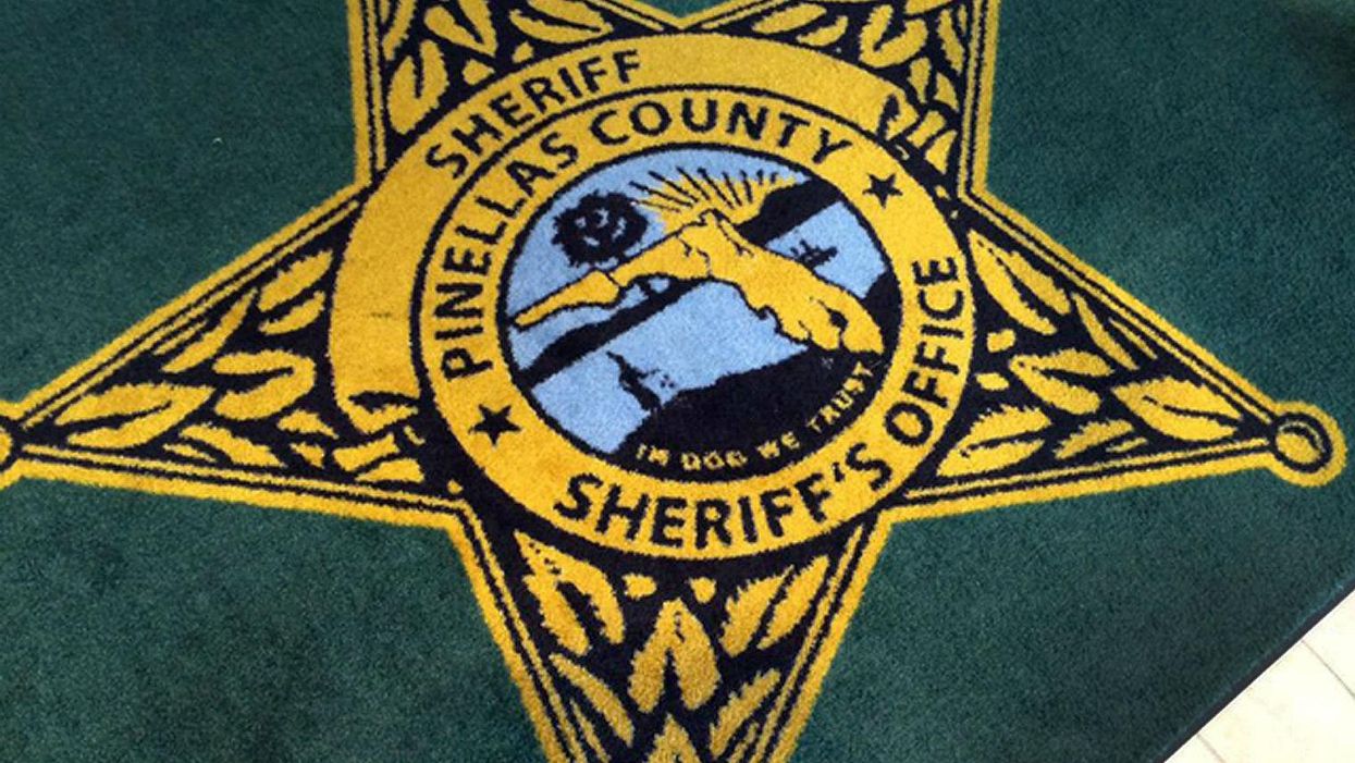 Can you spot the embarrassing typo on this police rug?