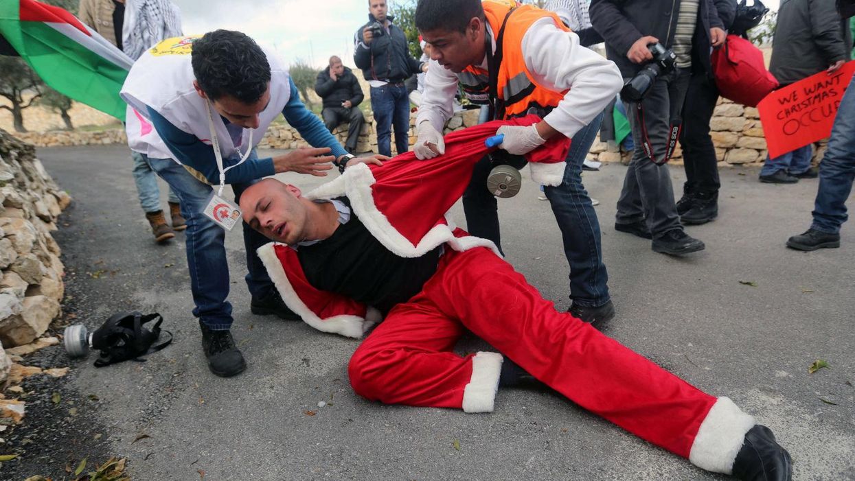 Welcome to Bethlehem, where Palestinian Santas are tear-gassed
