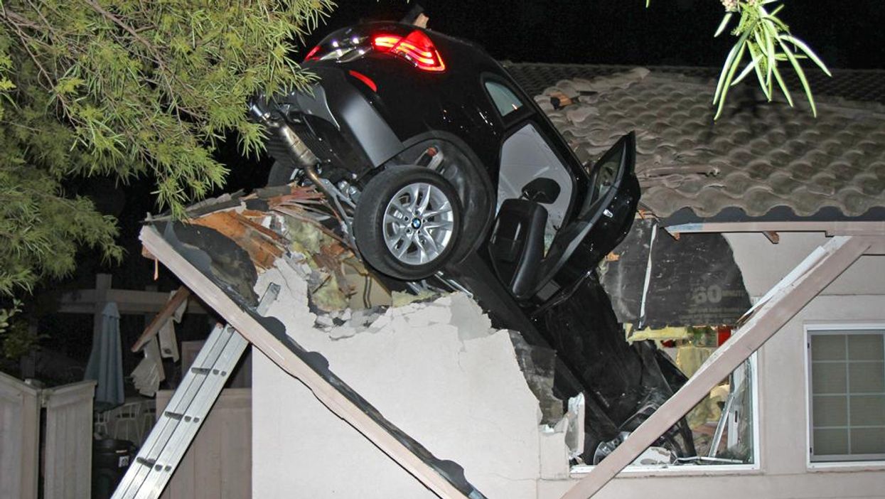 How this car ended up crashing through the roof of a house