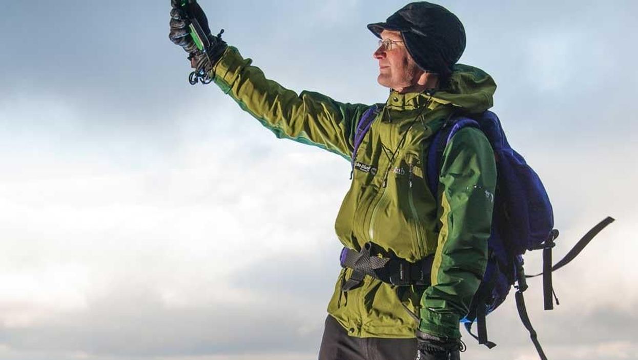 This man gets paid to climb mountains. He's got a job going