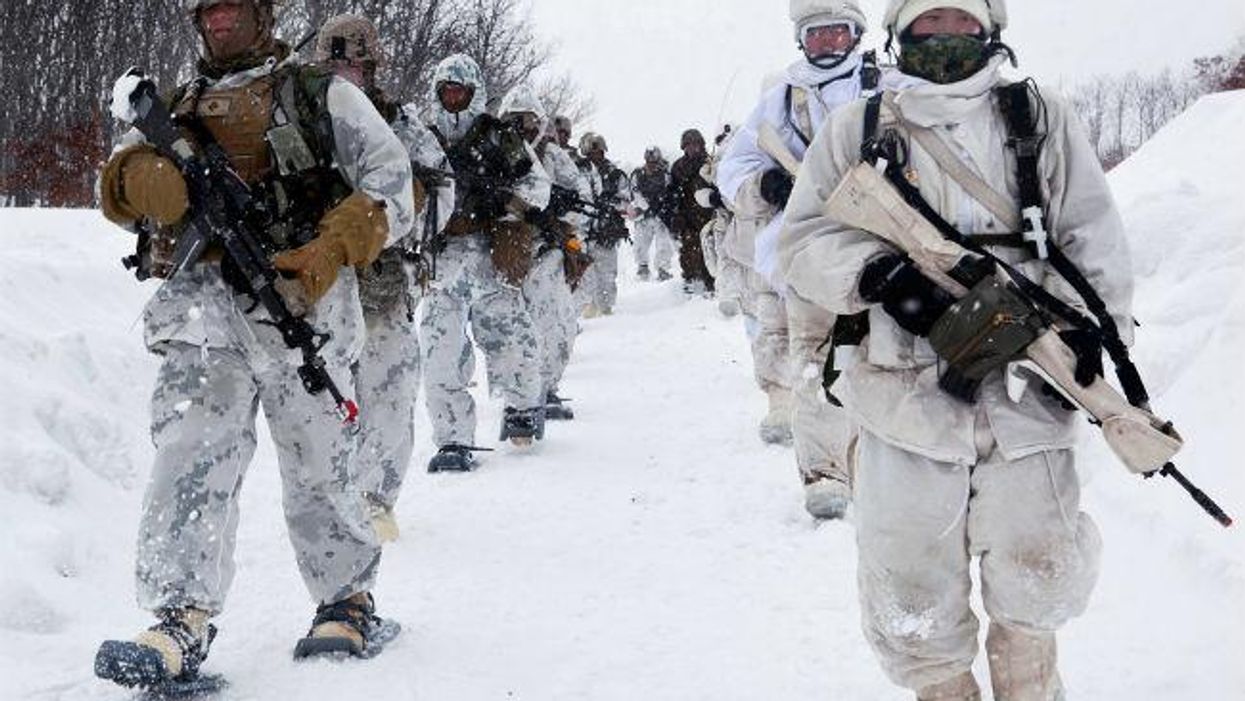 Why did police in New Orleans buy snow camouflage?