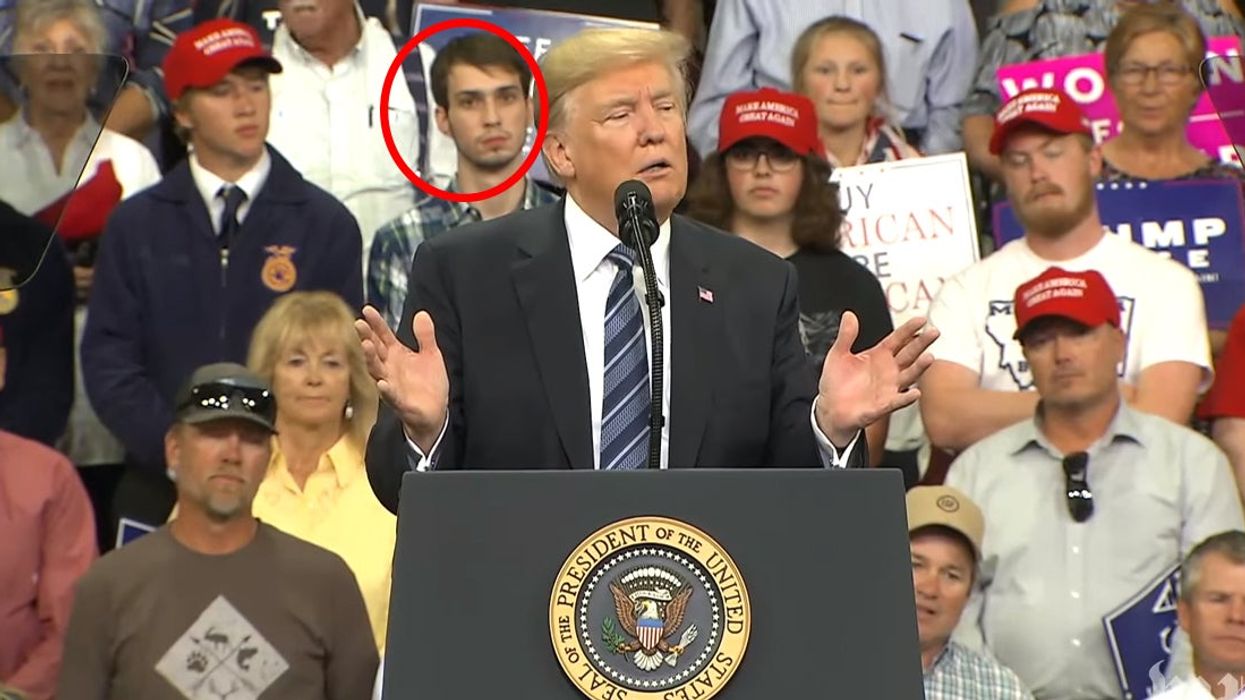 Man at Trump rally stands behind president and precedes to mock him