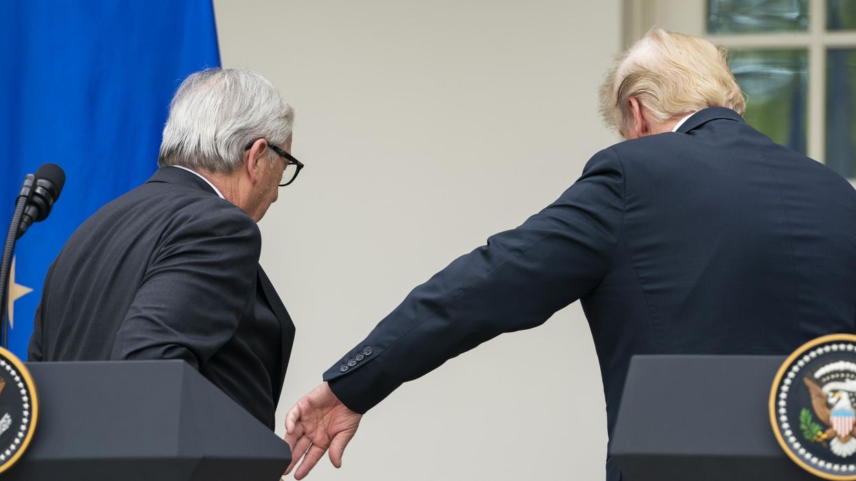 Trump tries to hold hands with Juncker during White House visit but gets rejected