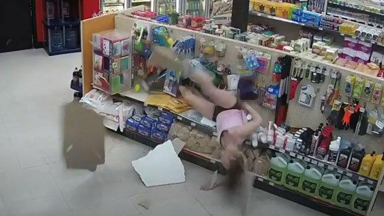 Incredible security footage captures couple's dramatic escape from police officers