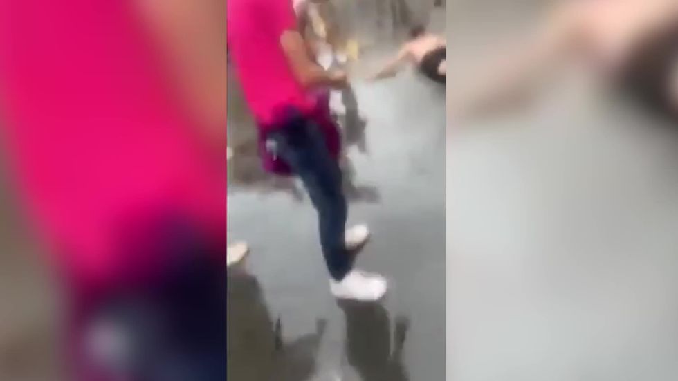Euro 2020: Cheers as Scotland fan slides through puddle in London