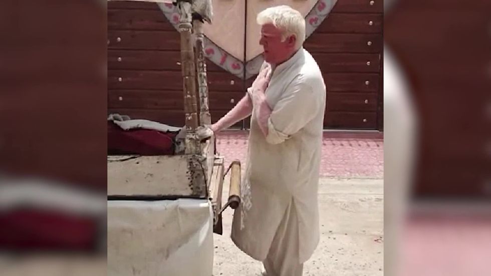 Donald Trump albino 'doppelganger' sings from his ice-cream stall in Pakistan