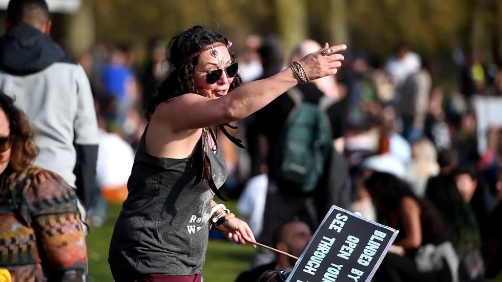 Crowd gathers for anti-lockdown protest in central London