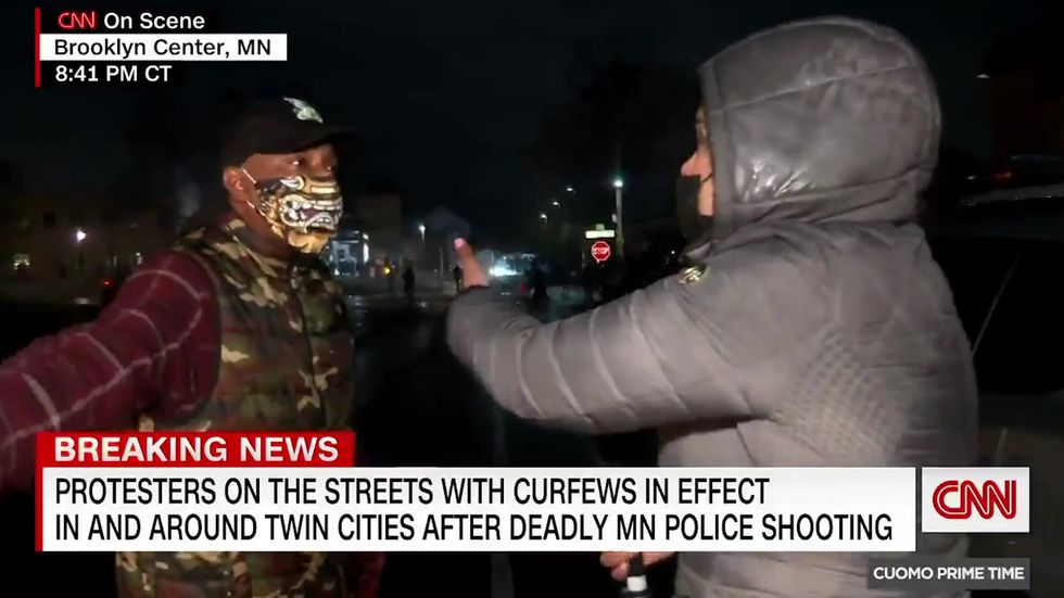 Minneapolis: Reporter challenged on air in tense scenes