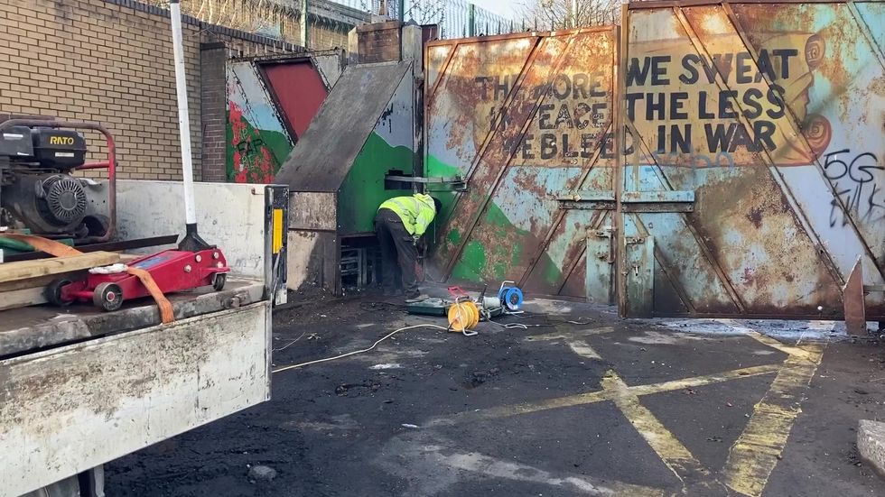 Clean-up underway after night of disorder in west Belfast