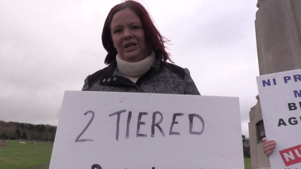 Small protest outside Stormont over recent disorder