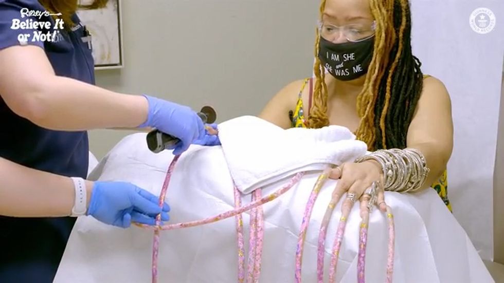 Woman with the world’s longest nails gets an extreme manicure