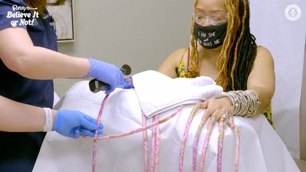 Woman with the world’s longest nails gets an extreme manicure