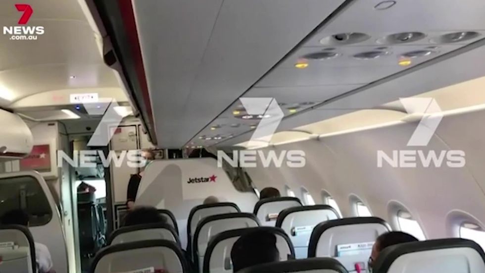Passengers flee from flight after lockdown is announced over loudspeaker