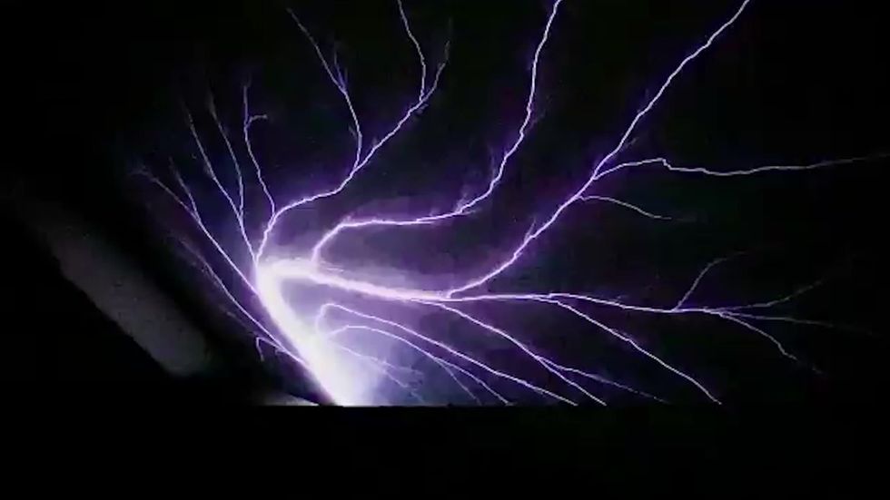 Pilot films incredible lightning storm from cockpit
