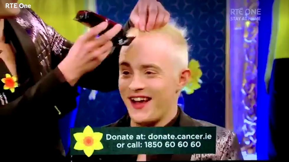 Jedward shave their famous quiffs for cancer charity