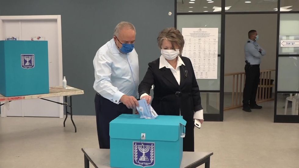 Yisrael Beiteinu leader slams PM Benjamin Netanyahu as he casts vote