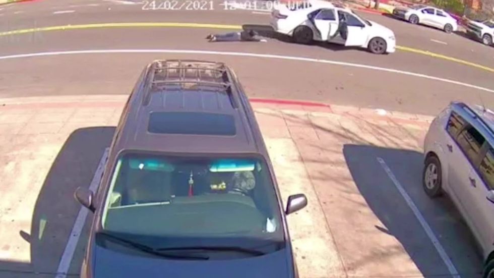 Woman dragged along road in car after being robbed in Oakland