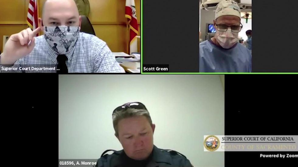 Doctor calls into virtual traffic trial while performing surgery