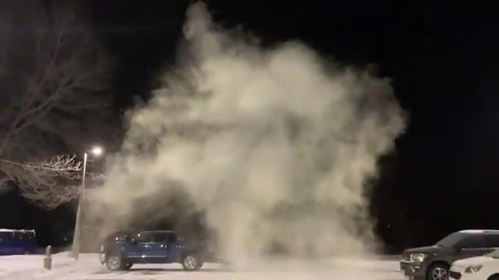 This is what happens when you toss a cup of warm water into -21 degree air