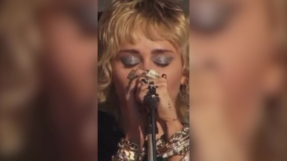 Miley Cyrus breaks down during performance of Wrecking Ball