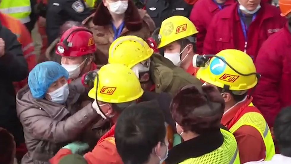 Miners rescued in China after two weeks underground