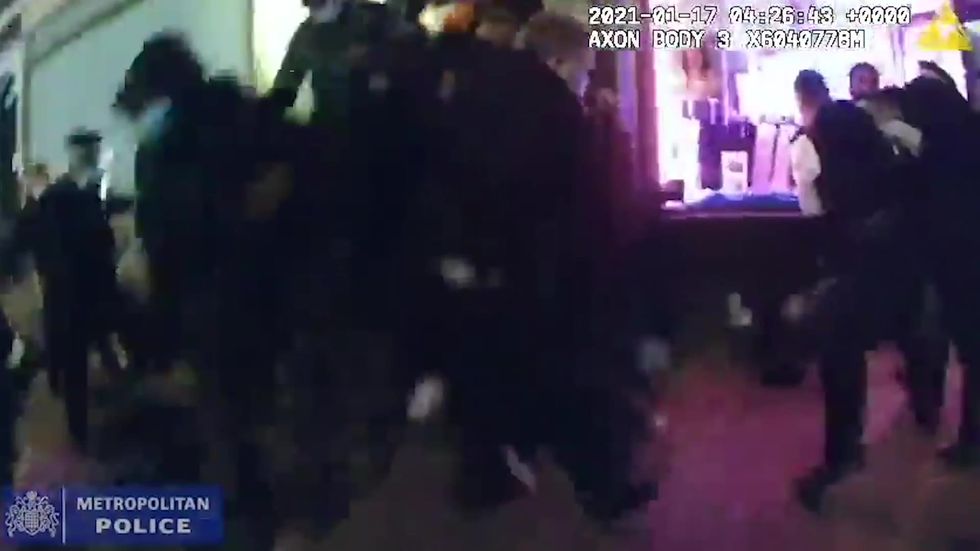 Police injured while breaking up illegal gathering of 200 people