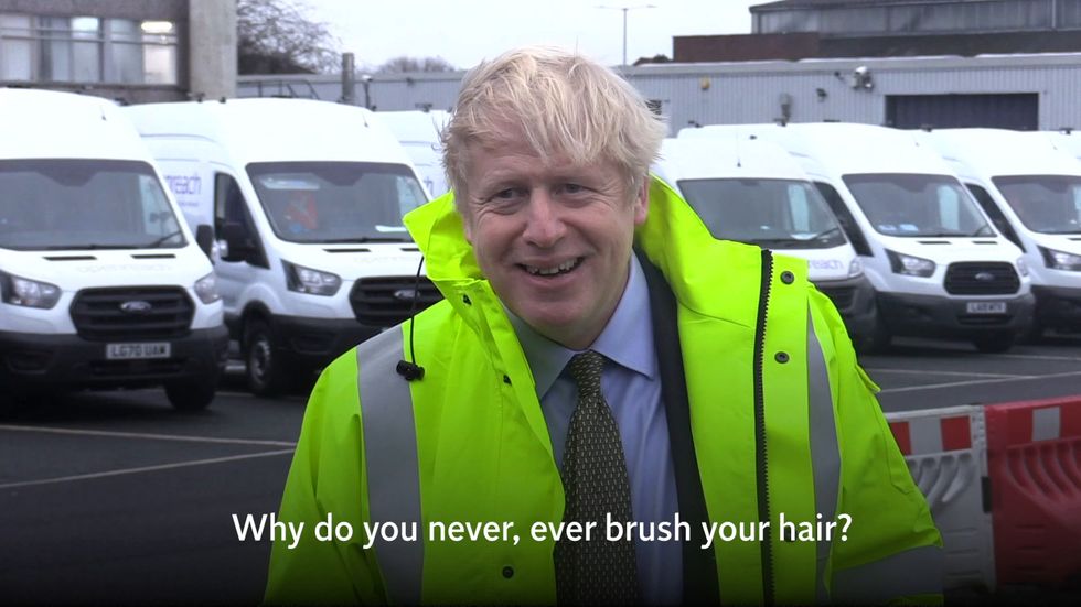 Boris Johnson apologies for his messy hair