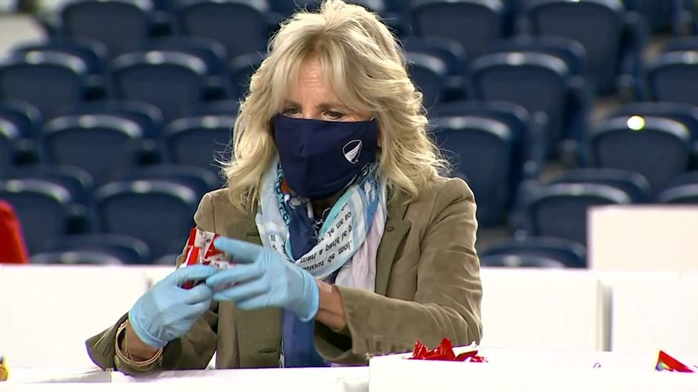 Dr. Jill Biden assembles packages for US troops over Christmas