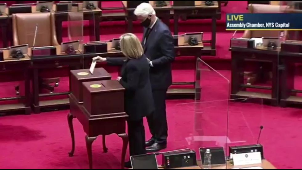 Hillary Clinton casts electoral college vote for Joe Biden