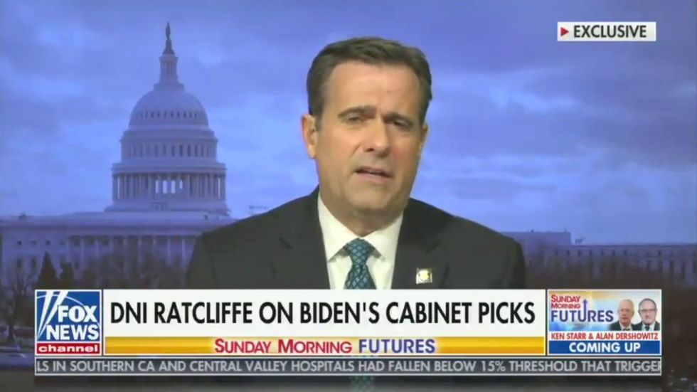 US intelligence director says 'we'll see' if there's a Biden administration