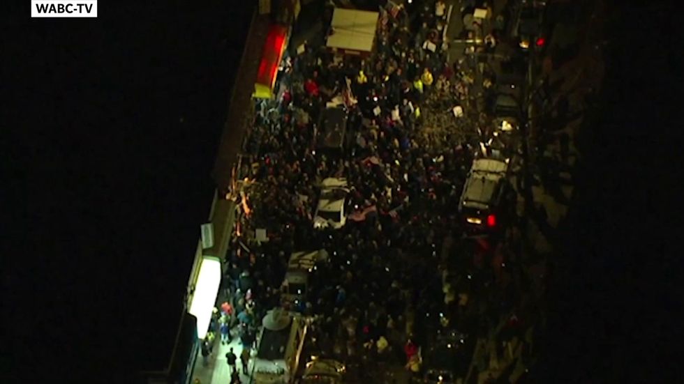 Protest outside Staten Island bar after owner arrested