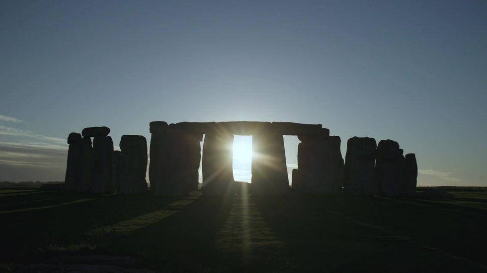 Stonehenge illuminated in dedication to unsung champions of UK heritage