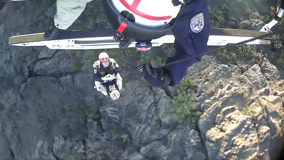 Hiker rescued after being trapped under boulder for 9 hours