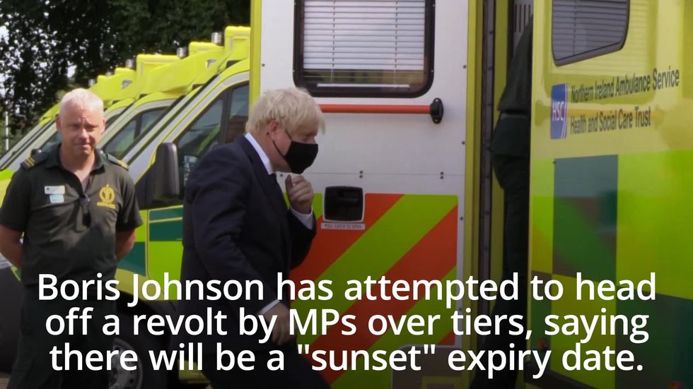 Boris Johnson attempts to head off rebellion by MPs over new tougher tiers