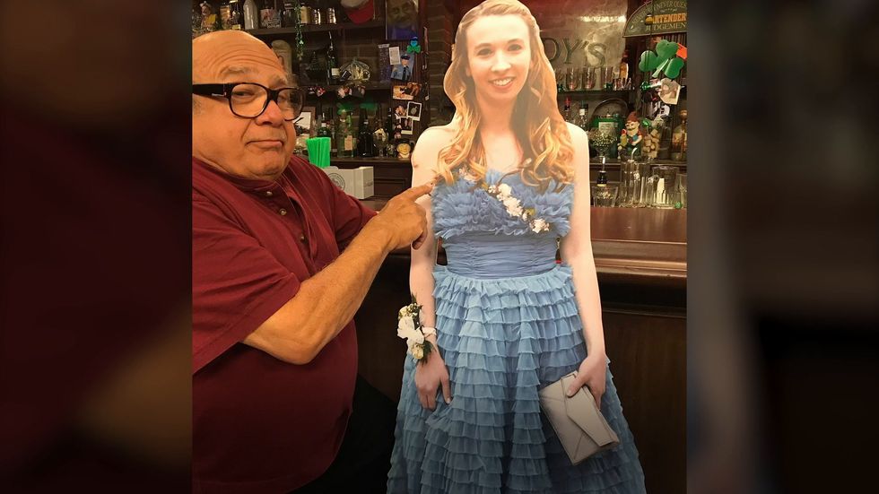 Danny DeVito takes cardboard cutout of teenager to set