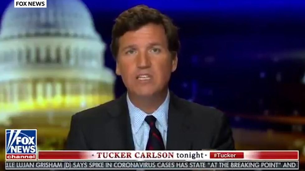 Tucker Carlson apologises after falsely claiming a dead person voted for Biden