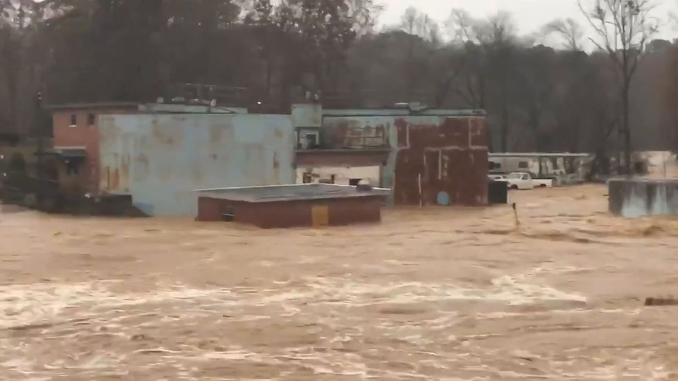 Buildings underwater in North Carolina after Storm Eta brings heavy rains
