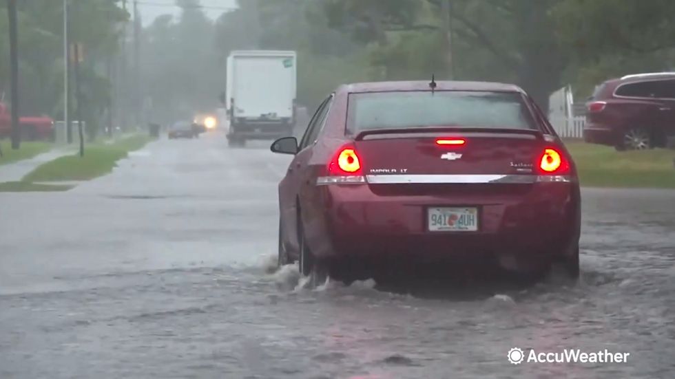 Residents of St. Petersburg, Florida, brave through flooded roads and streets as Eta approaches