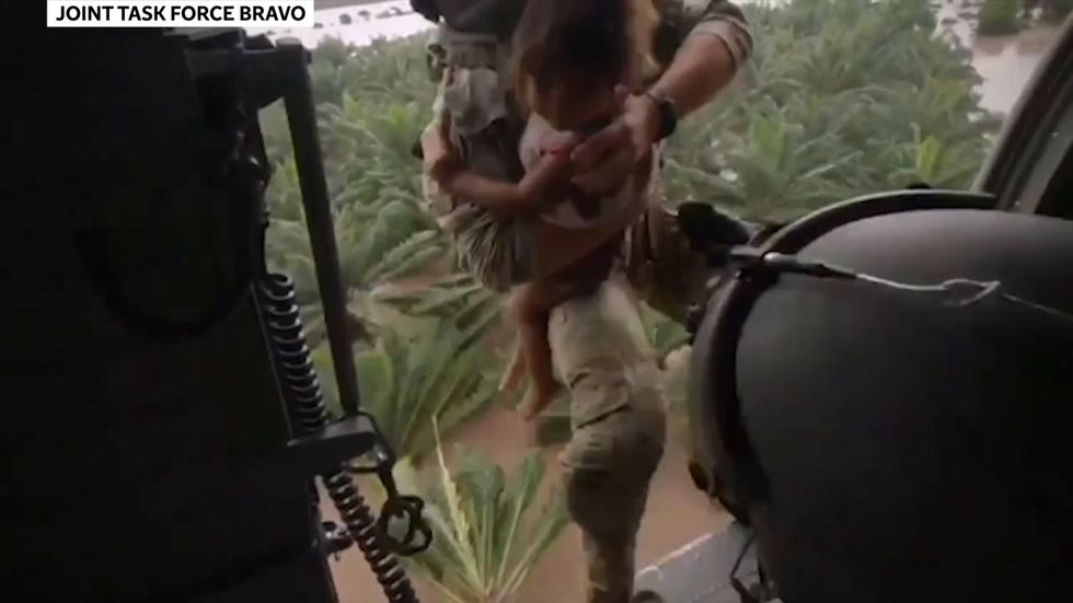 Three-year-old girl airlifted to safety during storm Eta in Honduras