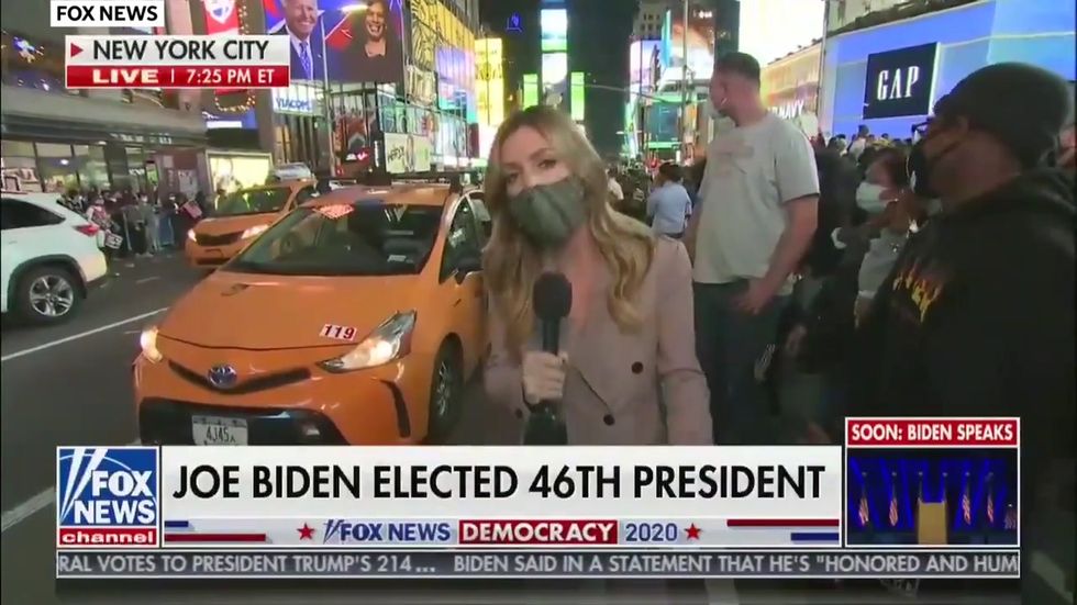Fox News reporter in Times Square drowned out by people chanting 'F*** Donald Trump'