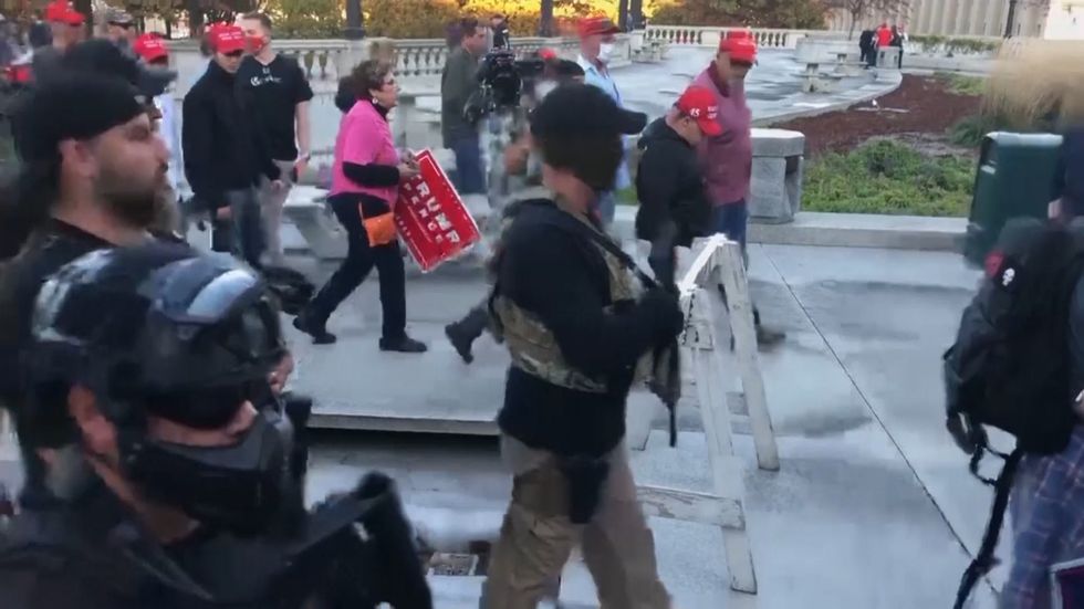Armed Trump supporters protest outside Pennsylvania state Capitol