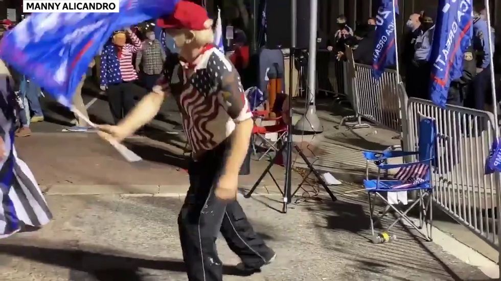 Trump fans dance and sing to Rage Against the Machine's 'Killing in the Name'
