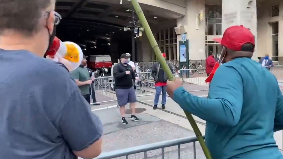Trump supporters and Count Every Vote demonstrators surround Pennsylvania Convention Centre