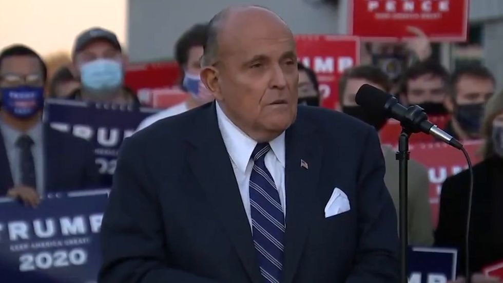 Rudy Giuliani leads wild attack on US democracy, promising wave of lawsuits to stop Biden