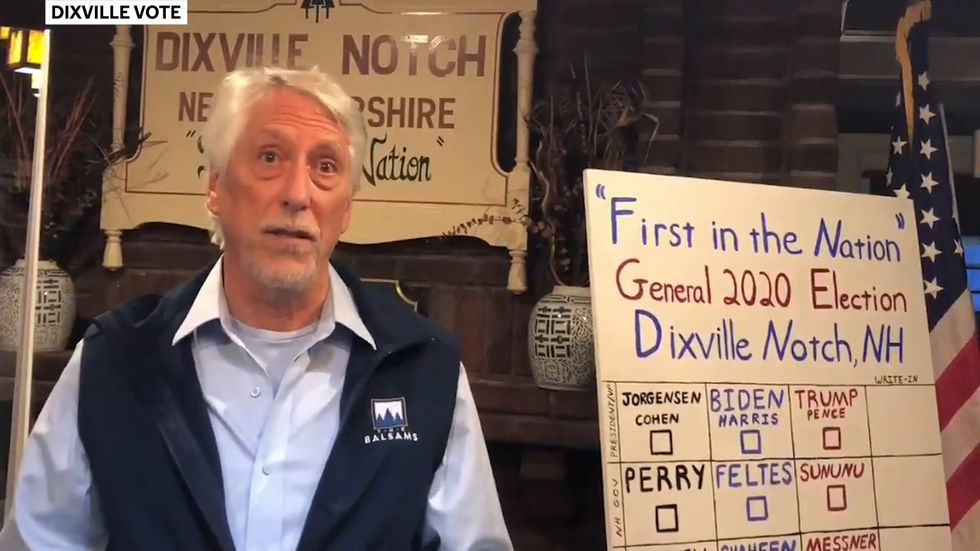 Lifelong Republican first to cast vote at midnight for Joe Biden