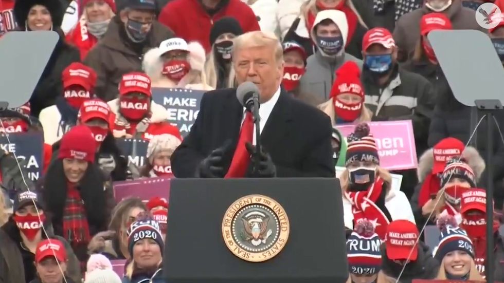 Trump launches attack on Ilhan Omar at rally and claims Biden will turn Michigan into refugee camp