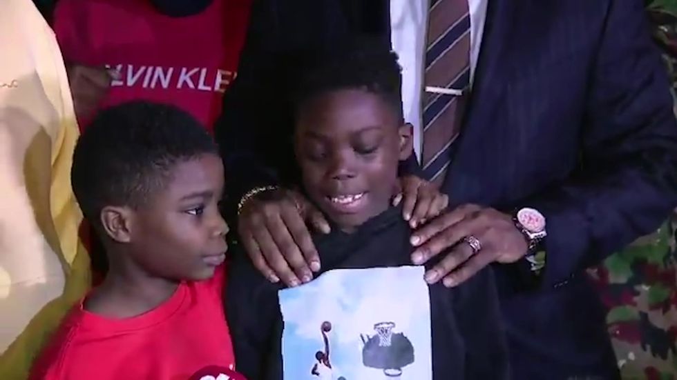 Walter Wallace's young son calls for calm after Philadelphia shooting
